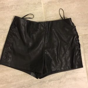 Leather shorts with lace detail